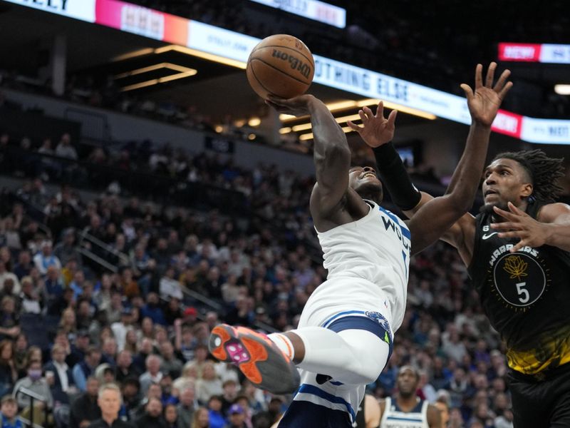 MINNEAPOLIS, MN -  FEBRUARY 1: Anthony Edwards #1 of the Minnesota Timberwolves drives to the basket during the game against the Golden State Warriors on February 1, 2023 at Target Center in Minneapolis, Minnesota. NOTE TO USER: User expressly acknowledges and agrees that, by downloading and or using this Photograph, user is consenting to the terms and conditions of the Getty Images License Agreement. Mandatory Copyright Notice: Copyright 2023 NBAE (Photo by Jordan Johnson/NBAE via Getty Images)