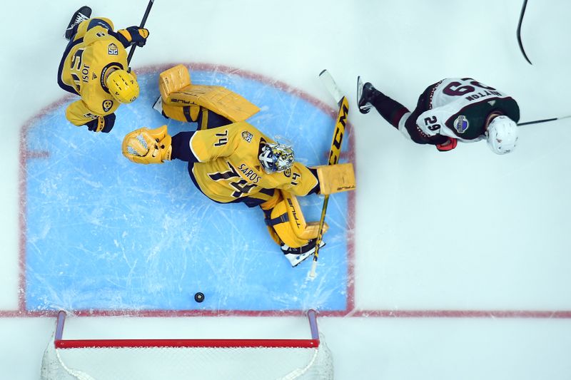 Feb 10, 2024; Nashville, Tennessee, USA; Nashville Predators goaltender Juuse Saros (74) allows a goal to Arizona Coyotes defenseman Juuso Valimaki (not pictured) during the second period at Bridgestone Arena. Mandatory Credit: Christopher Hanewinckel-USA TODAY Sports