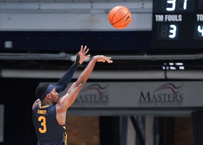 Dec 9, 2023; Indianapolis, Indiana, USA;  California Golden Bears guard Keonte Kennedy (3) makes a three-point basket against the Butler Bulldogs during the first half at Hinkle Fieldhouse. Mandatory Credit: Robert Goddin-USA TODAY Sports