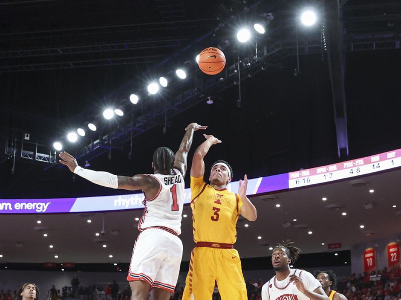 Feb 19, 2024; Houston, Texas, USA; Iowa State Cyclones guard Tamin Lipsey (3) shoots the ball as Houston Cougars guard Jamal Shead (1) defends during the first half at Fertitta Center. Mandatory Credit: Troy Taormina-USA TODAY Sports