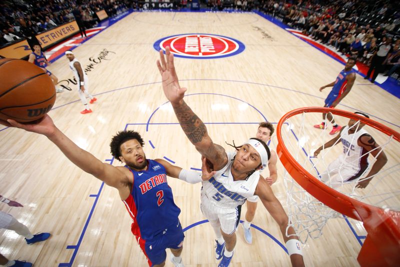 DETROIT, MI - FEBRUARY 24:  Cade Cunningham #2 of the Detroit Pistons goes to the basket during the game on February 24, 2024 at Little Caesars Arena in Detroit, Michigan. NOTE TO USER: User expressly acknowledges and agrees that, by downloading and/or using this photograph, User is consenting to the terms and conditions of the Getty Images License Agreement. Mandatory Copyright Notice: Copyright 2024 NBAE (Photo by Brian Sevald/NBAE via Getty Images)