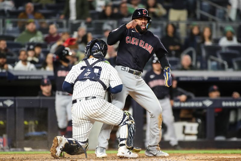 May 1, 2023; Bronx, New York, USA;  Cleveland Guardians shortstop Amed Rosario (1) reacts after scoring the tying the run in the ninth inning against the New York Yankees at Yankee Stadium. Mandatory Credit: Wendell Cruz-USA TODAY Sports