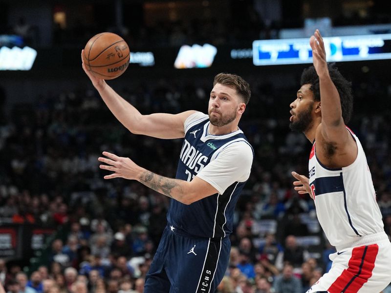 DALLAS, TX - FEBRUARY 12: Luka Doncic #77 of the Dallas Mavericks handles the ball during the game against the Washington Wizards on February 12, 2024 at the American Airlines Center in Dallas, Texas. NOTE TO USER: User expressly acknowledges and agrees that, by downloading and or using this photograph, User is consenting to the terms and conditions of the Getty Images License Agreement. Mandatory Copyright Notice: Copyright 2024 NBAE (Photo by Glenn James/NBAE via Getty Images)