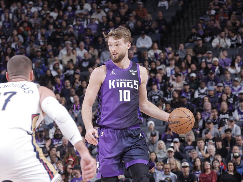 SACRAMENTO, CA - JANUARY 7:  Domantas Sabonis #10 of the Sacramento Kings handles the ball during the game  on January 7, 2024 at Golden 1 Center in Sacramento, California. NOTE TO USER: User expressly acknowledges and agrees that, by downloading and or using this Photograph, user is consenting to the terms and conditions of the Getty Images License Agreement. Mandatory Copyright Notice: Copyright 2024 NBAE (Photo by Rocky Widner/NBAE via Getty Images)