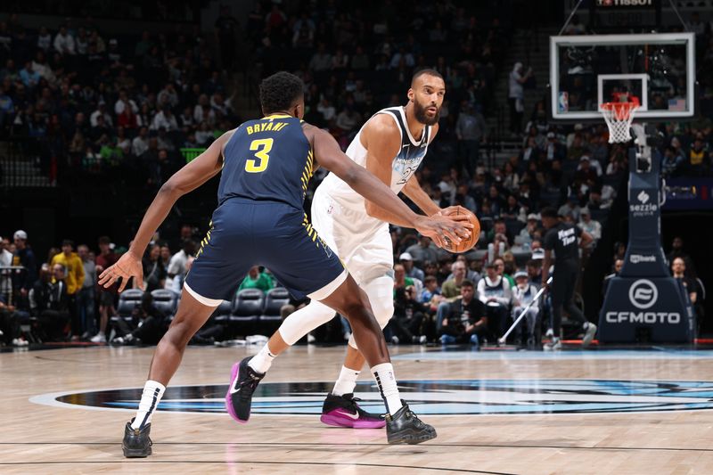 MINNEAPOLIS, MN -  MARCH  17:  Rudy Gobert #27 of the Minnesota Timberwolves handles the ball during the game against the Indiana Pacers on March 17, 2025 at Target Center in Minneapolis, Minnesota. NOTE TO USER: User expressly acknowledges and agrees that, by downloading and or using this Photograph, user is consenting to the terms and conditions of the Getty Images License Agreement. Mandatory Copyright Notice: Copyright 2025 NBAE (Photo by David Sherman/NBAE via Getty Images)