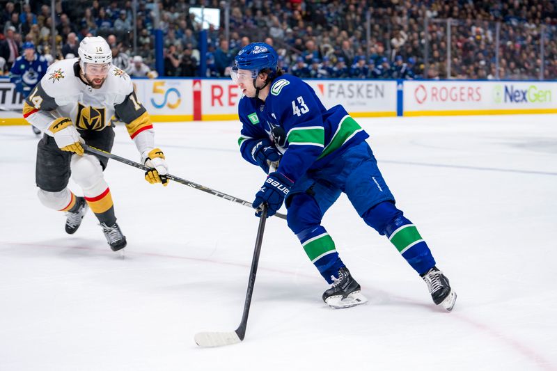 Apr 8, 2024; Vancouver, British Columbia, CAN; Vancouver Canucks defenseman Quinn Hughes (43) drives on Vegas Golden Knights defenseman Nicolas Hague (14) in the first period at Rogers Arena. Mandatory Credit: Bob Frid-USA TODAY Sports