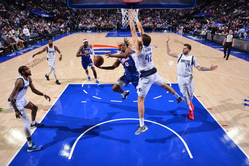 PHILADELPHIA, PA - FEBRUARY 5: Tyrese Maxey #0 of the Philadelphia 76ers drives to the basket during the game against the Dallas Mavericks on February 5, 2024 at the Wells Fargo Center in Philadelphia, Pennsylvania NOTE TO USER: User expressly acknowledges and agrees that, by downloading and/or using this Photograph, user is consenting to the terms and conditions of the Getty Images License Agreement. Mandatory Copyright Notice: Copyright 2024 NBAE (Photo by Jesse D. Garrabrant/NBAE via Getty Images)