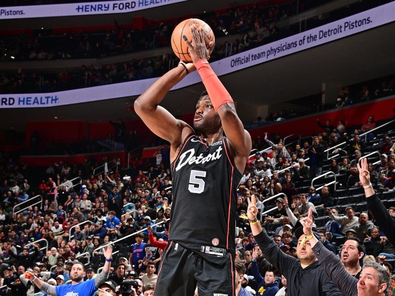 DETROIT, MI - APRIL 1: Chimezie Metu #5 of the Detroit Pistons shoots a three point basket during the game against the Memphis Grizzlies on April 1, 2024 at Little Caesars Arena in Detroit, Michigan. NOTE TO USER: User expressly acknowledges and agrees that, by downloading and/or using this photograph, User is consenting to the terms and conditions of the Getty Images License Agreement. Mandatory Copyright Notice: Copyright 2024 NBAE (Photo by Chris Schwegler/NBAE via Getty Images)