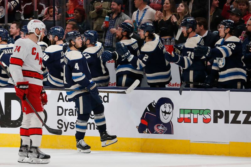 Feb 29, 2024; Columbus, Ohio, USA; Columbus Blue Jackets Forward Cole Sillinger (4) celebrates his goal against the Carolina Hurricanes during the second period at Nationwide Arena. Mandatory Credit: Russell LaBounty-USA TODAY Sports