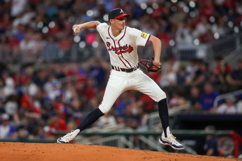 May 30, 2024; Atlanta, Georgia, USA; Atlanta Braves relief pitcher Jimmy Herget (64) throws against the Washington Nationals in the eighth inning at Truist Park. Mandatory Credit: Brett Davis-USA TODAY Sports