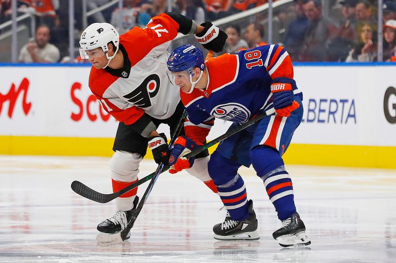 Oct 15, 2024; Edmonton, Alberta, CAN; Edmonton Oilers forward Zach Hyman (18) and Philadelphia Flyers forward Tyson Foerster (71) battle for position  during the second period at Rogers Place. Mandatory Credit: Perry Nelson-Imagn Images