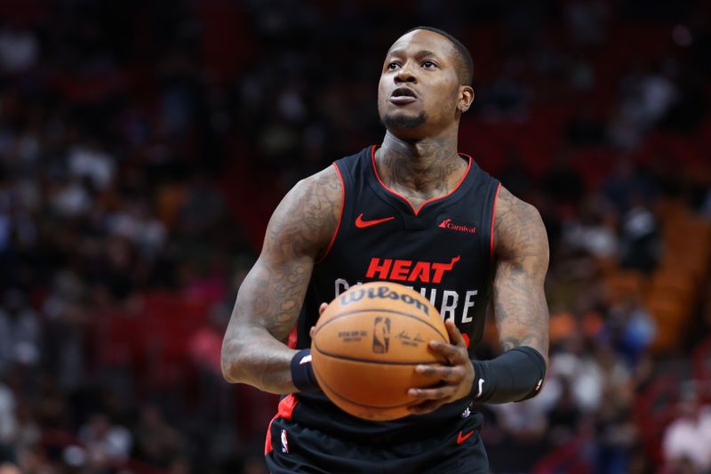 MIAMI, FLORIDA - JANUARY 24: Terry Rozier #2 of the Miami Heat shoots a free throw against the Memphis Grizzlies during the second quarter of the game at Kaseya Center on January 24, 2024 in Miami, Florida. NOTE TO USER: User expressly acknowledges and agrees that, by downloading and or using this photograph, User is consenting to the terms and conditions of the Getty Images License Agreement. (Photo by Megan Briggs/Getty Images)