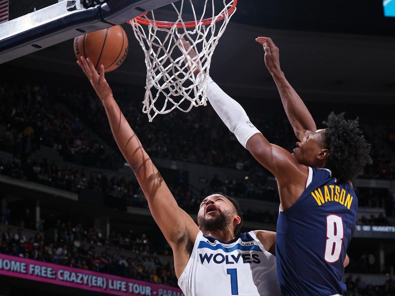 DENVER, CO - APRIL 10: Kyle Anderson #1 of the Minnesota Timberwolves drives to the basket during the game against the Denver Nuggets on April 10, 2024 at the Ball Arena in Denver, Colorado. NOTE TO USER: User expressly acknowledges and agrees that, by downloading and/or using this Photograph, user is consenting to the terms and conditions of the Getty Images License Agreement. Mandatory Copyright Notice: Copyright 2024 NBAE (Photo by Garrett Ellwood/NBAE via Getty Images)