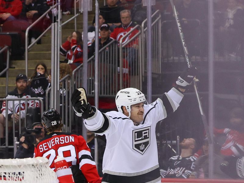 Feb 23, 2023; Newark, New Jersey, USA; Los Angeles Kings right wing Viktor Arvidsson (33) celebrates his goal against the New Jersey Devils during the first period at Prudential Center. Mandatory Credit: Ed Mulholland-USA TODAY Sports