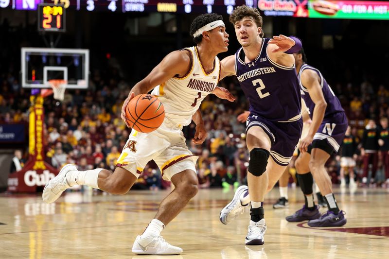 Feb 25, 2025; Minneapolis, Minnesota, USA; Minnesota Golden Gophers guard Isaac Asuma (1) works around Northwestern Wildcats forward Nick Martinelli (2) during the first half at Williams Arena. Mandatory Credit: Matt Krohn-Imagn Images