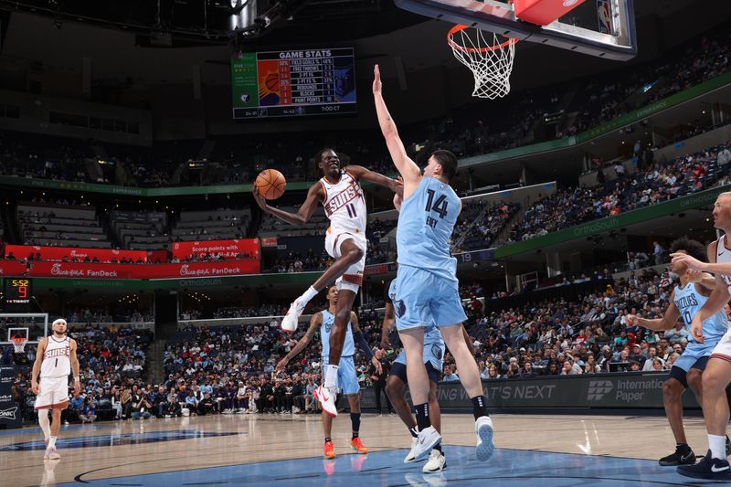 MEMPHIS, TN - FEBRUARY 25: Bol Bol #11 of the Phoenix Suns drives to the basket during the game against the Memphis Grizzlies on February 25, 2025 at FedExForum in Memphis, Tennessee. NOTE TO USER: User expressly acknowledges and agrees that, by downloading and or using this photograph, User is consenting to the terms and conditions of the Getty Images License Agreement. Mandatory Copyright Notice: Copyright 2025 NBAE (Photo by Joe Murphy/NBAE via Getty Images)