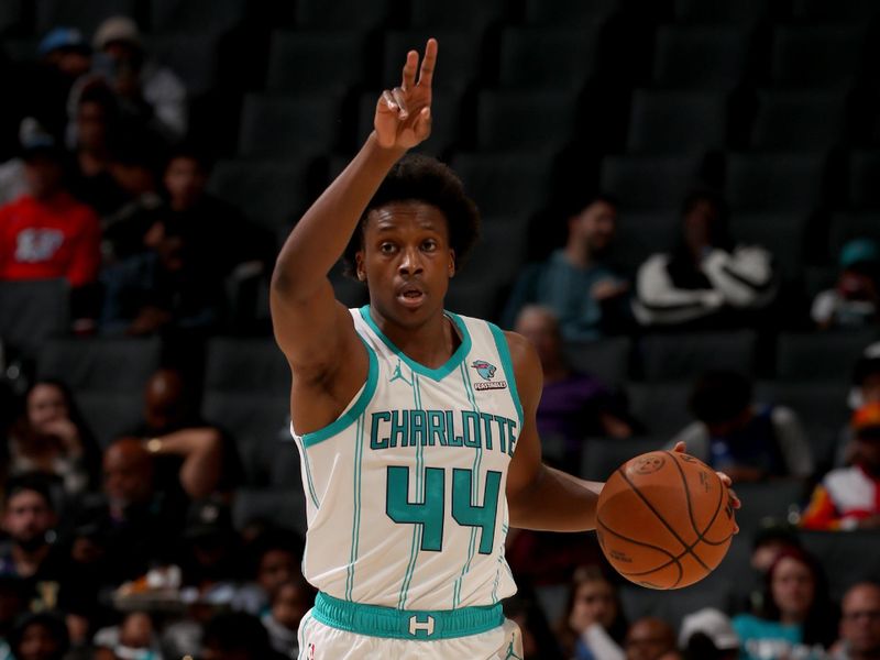 CHARLOTTE, NC - OCTOBER 15: Frank Ntilinkina #44 of the Charlotte Hornets dribbles the ball during the game against the Oklahoma City Thunder on October 15, 2023 at Spectrum Center in Charlotte, North Carolina. NOTE TO USER: User expressly acknowledges and agrees that, by downloading and or using this photograph, User is consenting to the terms and conditions of the Getty Images License Agreement. Mandatory Copyright Notice: Copyright 2023 NBAE (Photo by Kent Smith/NBAE via Getty Images)