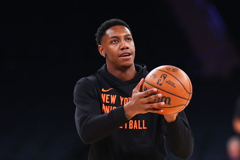 NEW YORK, NEW YORK - DECEMBER 25: RJ Barrett #9 of the New York Knicks shoots during warm up prior to the game against the Milwaukee Bucks at Madison Square Garden on December 25, 2023 in New York City.  NOTE TO USER: User expressly acknowledges and agrees that, by downloading and or using this photograph, User is consenting to the terms and conditions of the Getty Images License Agreement. (Photo by Rich Graessle/Getty Images)