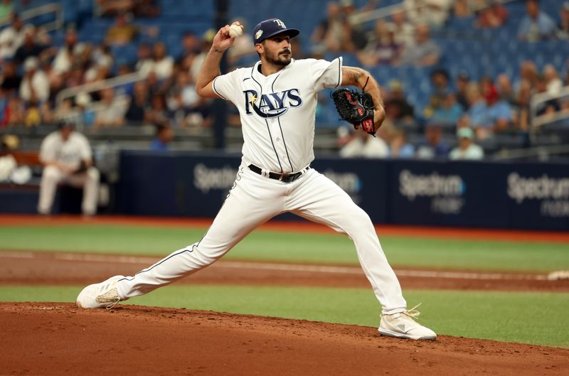 Sep 21, 2023; St. Petersburg, Florida, USA; Tampa Bay Rays starting pitcher Zach Eflin (24) throws a pitch during the second inning against the Los Angeles Angels at Tropicana Field. Mandatory Credit: Kim Klement Neitzel-USA TODAY Sports