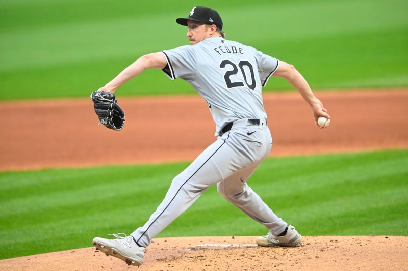 Apr 10, 2024; Cleveland, Ohio, USA; Chicago White Sox pitcher Erick Fedde (20) delivers a pitch first inning against the Cleveland Guardians at Progressive Field. Mandatory Credit: David Richard-USA TODAY Sports