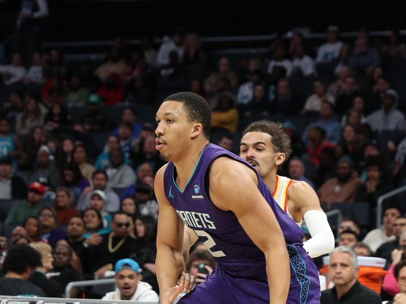 CHARLOTTE, NC - FEBRUARY 14: Grant Willams #2 of the Charlotte Hornets handles the ball during the game against the Atlanta Hawks on February 14, 2024 at Spectrum Center in Charlotte, North Carolina. NOTE TO USER: User expressly acknowledges and agrees that, by downloading and or using this photograph, User is consenting to the terms and conditions of the Getty Images License Agreement.  Mandatory Copyright Notice:  Copyright 2024 NBAE (Photo by Brock Williams-Smith/NBAE via Getty Images)