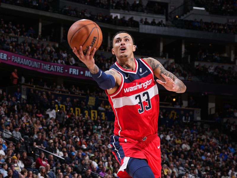 DENVER, CO - FEBRUARY 22: Kyle Kuzma #33 of the Washington Wizards drives to the basket during the game against the Denver Nuggets on February 22, 2024 at the Ball Arena in Denver, Colorado. NOTE TO USER: User expressly acknowledges and agrees that, by downloading and/or using this Photograph, user is consenting to the terms and conditions of the Getty Images License Agreement. Mandatory Copyright Notice: Copyright 2024 NBAE (Photo by Garrett Ellwood/NBAE via Getty Images)