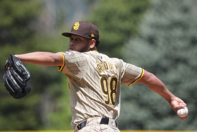 Apr 25, 2024; Denver, Colorado, USA; San Diego Padres starting pitcher Randy Vásquez (98) delivers a pitch in the first inning against the Colorado Rockies at Coors Field. Mandatory Credit: Ron Chenoy-USA TODAY Sports