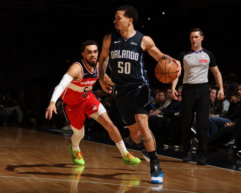 WASHINGTON, DC -? MARCH 6:  Cole Anthony #50 of the Orlando Magic handles the ball during the game  on March 6, 2024 at Capital One Arena in Washington, DC. NOTE TO USER: User expressly acknowledges and agrees that, by downloading and or using this Photograph, user is consenting to the terms and conditions of the Getty Images License Agreement. Mandatory Copyright Notice: Copyright 2024 NBAE (Photo by Stephen Gosling/NBAE via Getty Images)