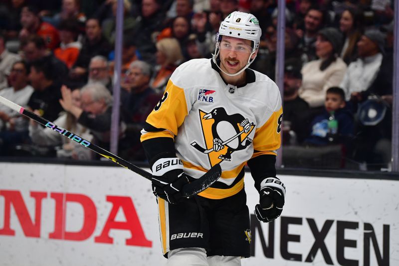 Jan 23, 2025; Anaheim, California, USA; Pittsburgh Penguins left wing Michael Bunting (8) reacts after scoring a power play goal against the Anaheim Ducks during the second period at Honda Center. Mandatory Credit: Gary A. Vasquez-Imagn Images