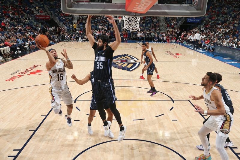 NEW ORLEANS, LA - OCTOBER 7: Jose Alvarado #15 of the New Orleans Pelicans drives to the basket during the game against the Orlando Magic on October 7, 2024 at the Smoothie King Center in New Orleans, Louisiana. NOTE TO USER: User expressly acknowledges and agrees that, by downloading and or using this Photograph, user is consenting to the terms and conditions of the Getty Images License Agreement. Mandatory Copyright Notice: Copyright 2024 NBAE (Photo by Layne Murdoch Jr./NBAE via Getty Images)