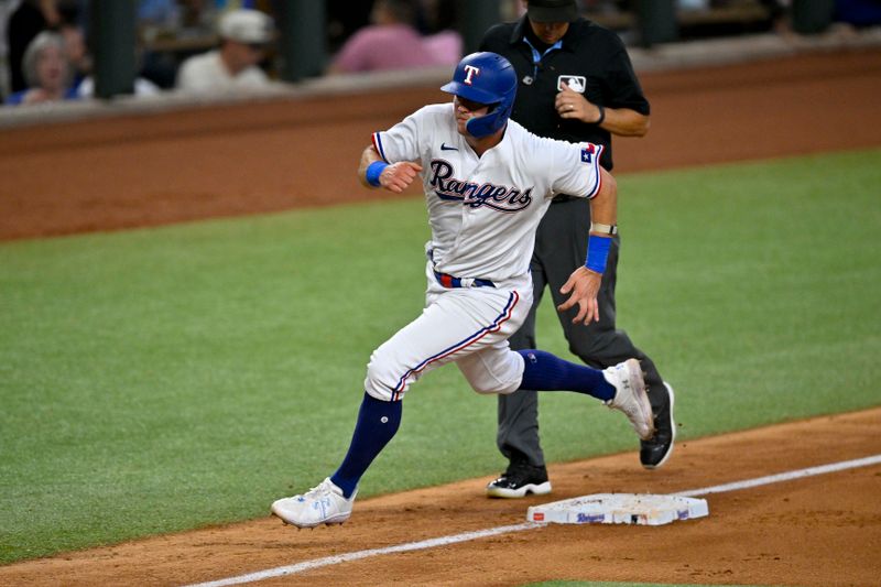 Aug 3, 2023; Arlington, Texas, USA; Texas Rangers third baseman Josh Jung (6) scores against the Chicago White Sox during the eighth inning at Globe Life Field. Mandatory Credit: Jerome Miron-USA TODAY Sports