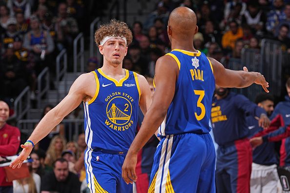 DENVER, CO - DECEMBER 25: Brandin Podziemski #2  and Chris Paul #3 of the Golden State Warriors high five during the game against the Denver Nuggets on December 25, 2023 at the Ball Arena in Denver, Colorado. NOTE TO USER: User expressly acknowledges and agrees that, by downloading and/or using this Photograph, user is consenting to the terms and conditions of the Getty Images License Agreement. Mandatory Copyright Notice: Copyright 2023 NBAE (Photo by Bart Young/NBAE via Getty Images)