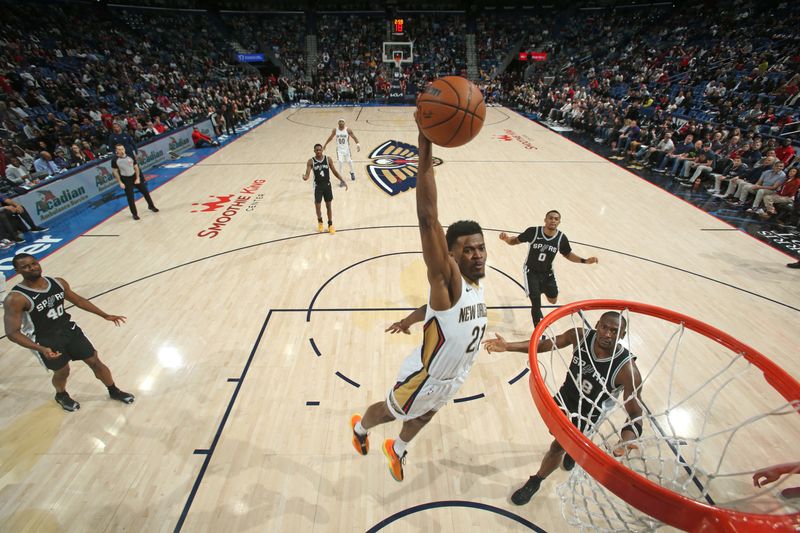 NEW ORLEANS, LA - FEBRUARY 25: Yves Missi #21 of the New Orleans Pelicans dunks the ball during the game against the San Antonio Spurs on February 25, 2025 at the Smoothie King Center in New Orleans, Louisiana. NOTE TO USER: User expressly acknowledges and agrees that, by downloading and or using this Photograph, user is consenting to the terms and conditions of the Getty Images License Agreement. Mandatory Copyright Notice: Copyright 2025 NBAE (Photo by Layne Murdoch Jr./NBAE via Getty Images)