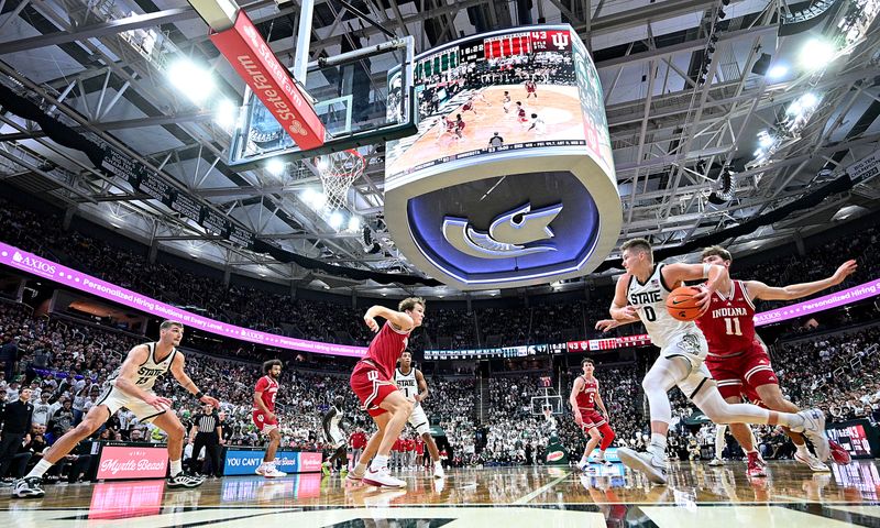 Jan 13, 2026; East Lansing, Michigan, USA;  Michigan State Spartans forward Jaxon Kohler (0) drives down the baseline against the Indiana Hoosiers during the second half at Jack Breslin Student Events Center. Mandatory Credit: Dale Young-Imagn Images