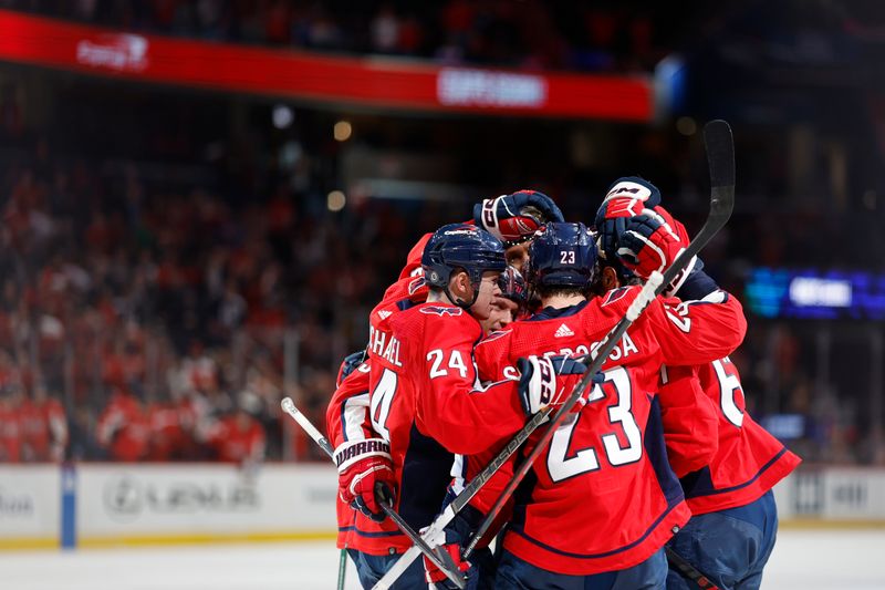 Feb 26, 2024; Washington, District of Columbia, USA; Washington Capitals left wing Max Pacioretty (67) celebrates with teammates after scoring a goal against the Ottawa Senators in the first period at Capital One Arena. Mandatory Credit: Geoff Burke-USA TODAY Sports