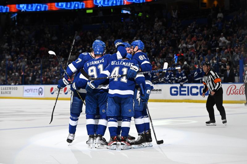 Mar 30, 2023; Tampa, Florida, USA; The Tampa Bay Lightning celebrate a goal in the first period against the Washington Capitals at Amalie Arena. Mandatory Credit: Jonathan Dyer-USA TODAY Sports