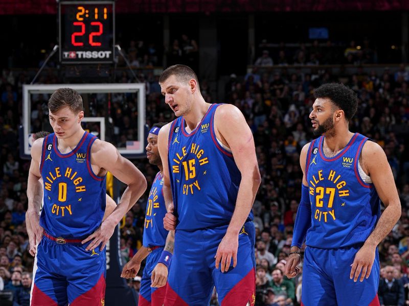 DENVER, CO - MARCH 25: The Denver Nuggets look on during the game against the Milwaukee Bucks on March 25, 2023 at the Ball Arena in Denver, Colorado. NOTE TO USER: User expressly acknowledges and agrees that, by downloading and/or using this Photograph, user is consenting to the terms and conditions of the Getty Images License Agreement. Mandatory Copyright Notice: Copyright 2023 NBAE (Photo by Garrett Ellwood/NBAE via Getty Images)