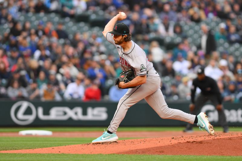 Apr 26, 2024; Seattle, Washington, USA; Arizona Diamondbacks starting pitcher Zac Gallen (23) pitches to the Seattle Mariners during the second inning at T-Mobile Park. Mandatory Credit: Steven Bisig-USA TODAY Sports