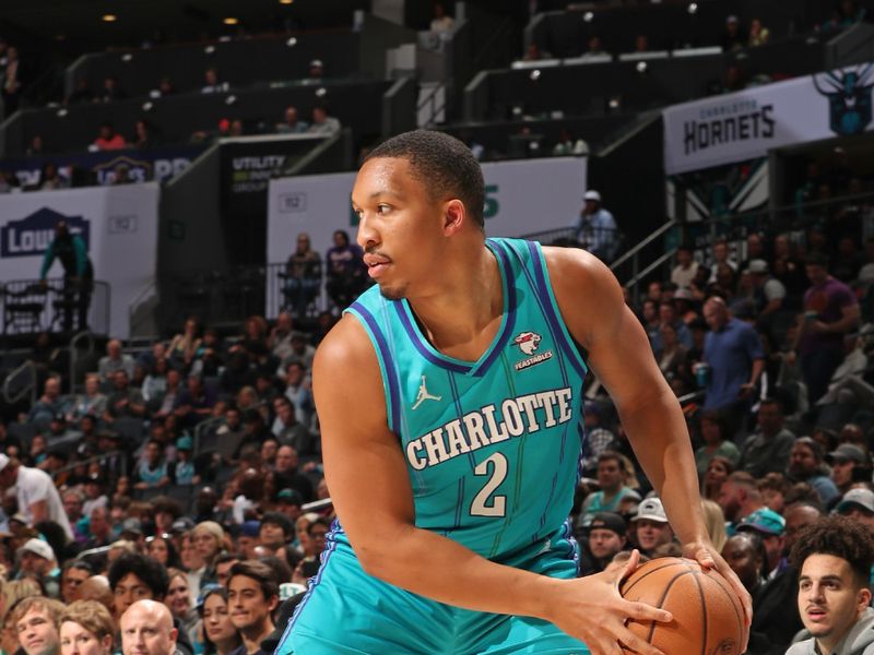 CHARLOTTE, NC - MARCH 15: Grant Williams #2 of the Charlotte Hornets handles the ball during the game against the Phoenix Suns on March 15, 2024 at Spectrum Center in Charlotte, North Carolina. NOTE TO USER: User expressly acknowledges and agrees that, by downloading and or using this photograph, User is consenting to the terms and conditions of the Getty Images License Agreement. Mandatory Copyright Notice: Copyright 2024 NBAE (Photo by Kent Smith/NBAE via Getty Images)