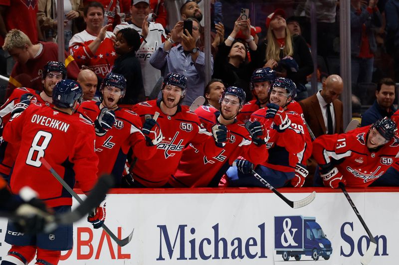 Oct 23, 2024; Washington, District of Columbia, USA; Washington Capitals left wing Alex Ovechkin (8) celebrates with teammates after scoring an empty net goal against the Philadelphia Flyers in the third period goal at Capital One Arena. Mandatory Credit: Geoff Burke-Imagn Images