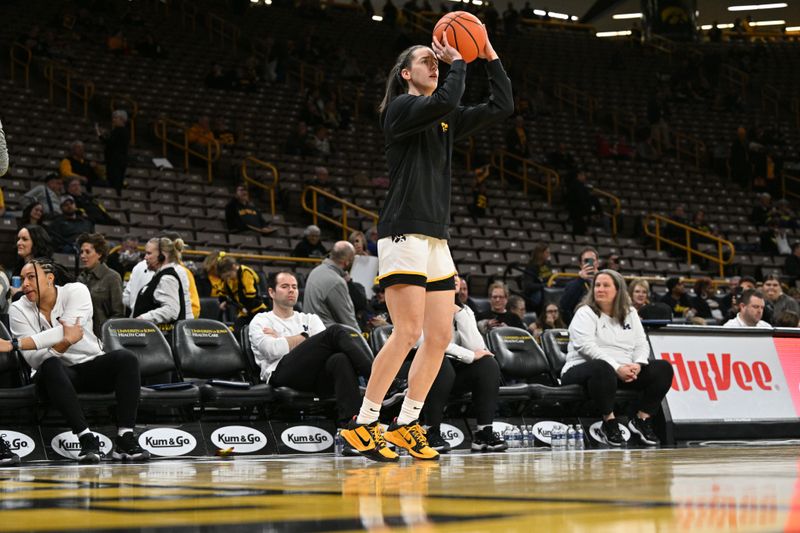 Feb 15, 2024; Iowa City, Iowa, USA; Iowa Hawkeyes guard Caitlin Clark (22) warms up before the game against the Michigan Wolverines at Carver-Hawkeye Arena. Mandatory Credit: Jeffrey Becker-USA TODAY Sports