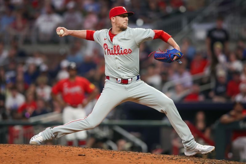 Jul 5, 2024; Atlanta, Georgia, USA; Philadelphia Phillies relief pitcher Jeff Hoffman (23) throws against the Atlanta Braves in the ninth inning at Truist Park. Mandatory Credit: Brett Davis-USA TODAY Sports