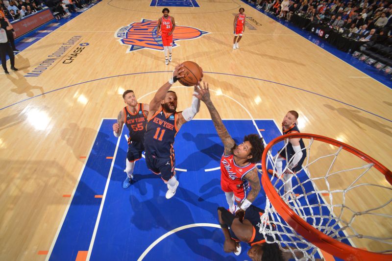 NEW YORK, NY - APRIL 22: Jalen Brunson #11 of the New York Knicks rebounds the ball during the game against the Philadelphia 76ers during Round 1 Game 2 of the 2024 NBA Playoffs on April 22, 2024 at Madison Square Garden in New York City, New York.  NOTE TO USER: User expressly acknowledges and agrees that, by downloading and or using this photograph, User is consenting to the terms and conditions of the Getty Images License Agreement. Mandatory Copyright Notice: Copyright 2024 NBAE  (Photo by Jesse D. Garrabrant/NBAE via Getty Images)