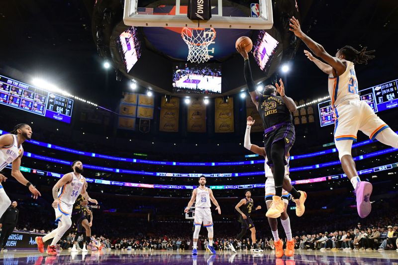 LOS ANGELES, CA - JANUARY 15: LeBron James #23 of the Los Angeles Lakers drives to the basket during the game against the Oklahoma City Thunder on January 15, 2024 at Crypto.Com Arena in Los Angeles, California. NOTE TO USER: User expressly acknowledges and agrees that, by downloading and/or using this Photograph, user is consenting to the terms and conditions of the Getty Images License Agreement. Mandatory Copyright Notice: Copyright 2024 NBAE (Photo by Adam Pantozzi/NBAE via Getty Images)