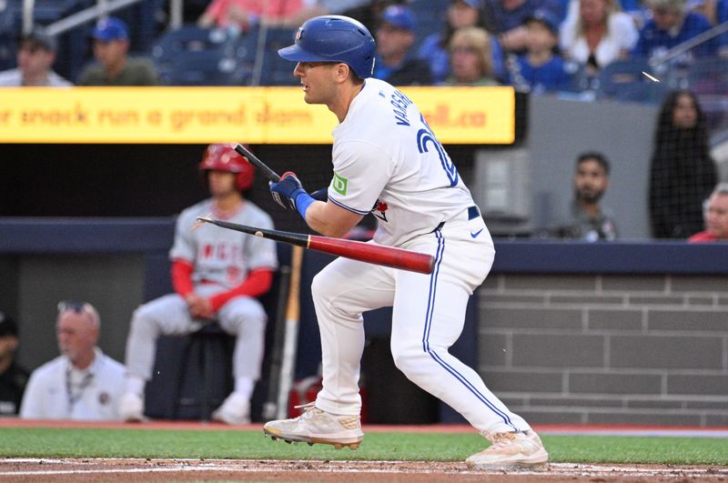 Aug 22, 2024; Toronto, Ontario, CAN;  Toronto Blue Jays center fielder Daulton Varsho (25) breaks his bat as he grounds out against the Los Angeles Angels in the first inning at Rogers Centre. Mandatory Credit: Dan Hamilton-USA TODAY Sports