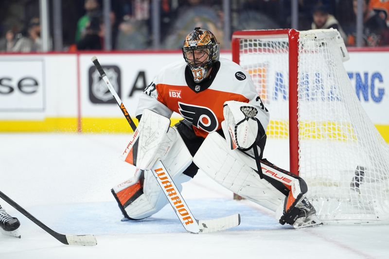Oct 28, 2025; Philadelphia, Pennsylvania, USA; Philadelphia Flyers goalie Samuel Ersson (33) defends the net against the Pittsburgh Penguins in the second period at Xfinity Mobile Arena. Mandatory Credit: Kyle Ross-Imagn Images