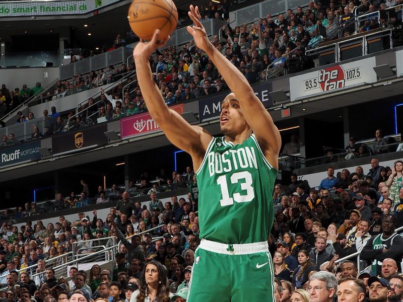 INDIANAPOLIS, IN - FEBRUARY 23: Malcolm Brogdon #13 of the Boston Celtics shoots a three point basket during the game against the Indiana Pacers on February 23, 2023 at Gainbridge Fieldhouse in Indianapolis, Indiana. NOTE TO USER: User expressly acknowledges and agrees that, by downloading and or using this Photograph, user is consenting to the terms and conditions of the Getty Images License Agreement. Mandatory Copyright Notice: Copyright 2023 NBAE (Photo by Ron Hoskins/NBAE via Getty Images)