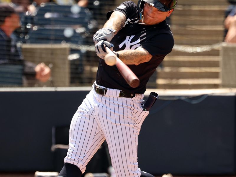 Mar 11, 2024; Tampa, Florida, USA; New York Yankees right fielder Alex Verdugo (24) singles during the first inning against the Baltimore Orioles  at George M. Steinbrenner Field. Mandatory Credit: Kim Klement Neitzel-USA TODAY Sports