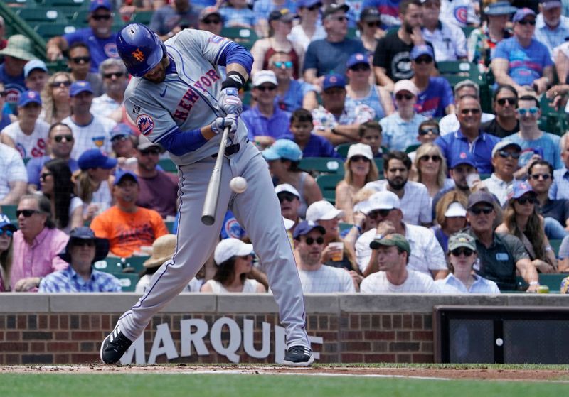 Jun 21, 2024; Chicago, Illinois, USA; New York Mets designated hitter J.D. Martinez (28) hits a three-run home run against the Chicago Cubs during the first inning at Wrigley Field. Mandatory Credit: David Banks-USA TODAY Sports
