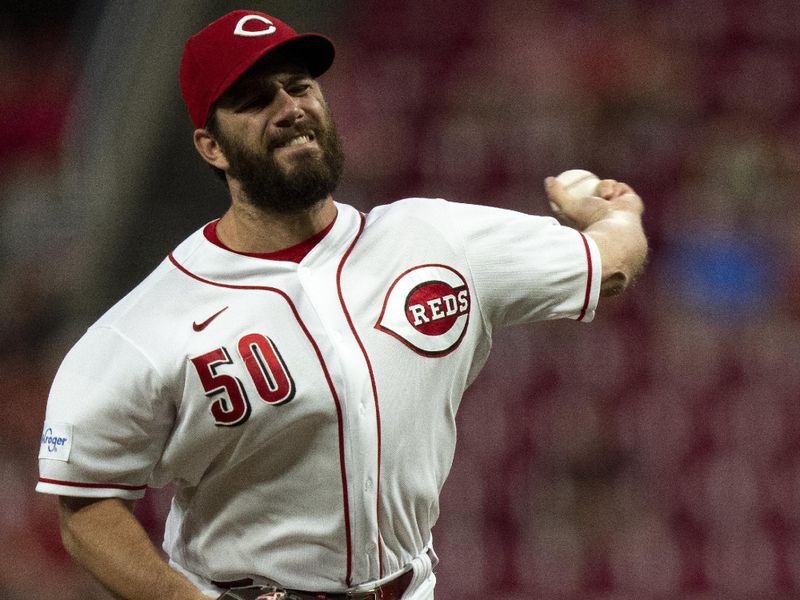 Sep 6, 2023; Cincinnati, Ohio, USA; Cincinnati Reds relief pitcher Sam Moll (50) pitches in the fifth inning of the MLB baseball game between the Cincinnati Reds and the Seattle Mariners at Great American Ball Park. Mandatory Credit: Albert Cesare-USA TODAY Sports